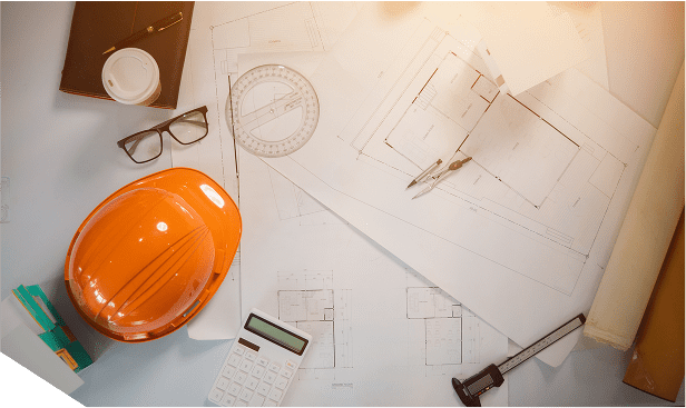 A construction project with hard hat and calculator.