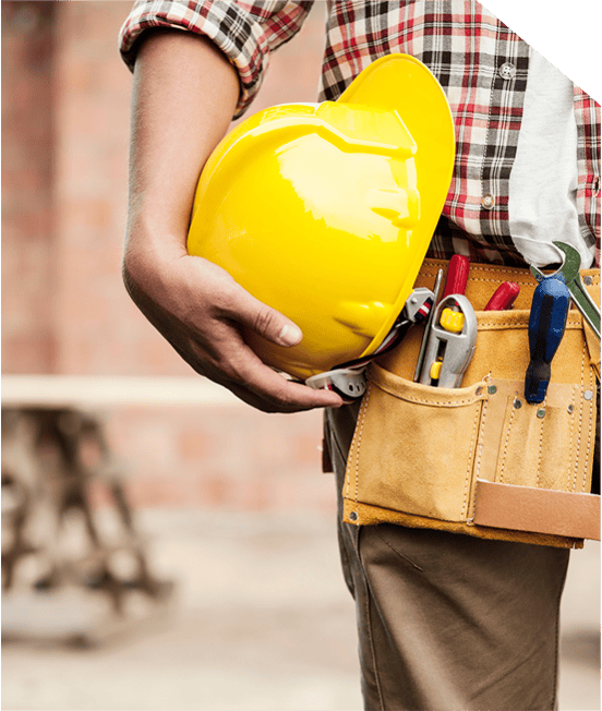 A man holding a yellow hard hat in his work belt.