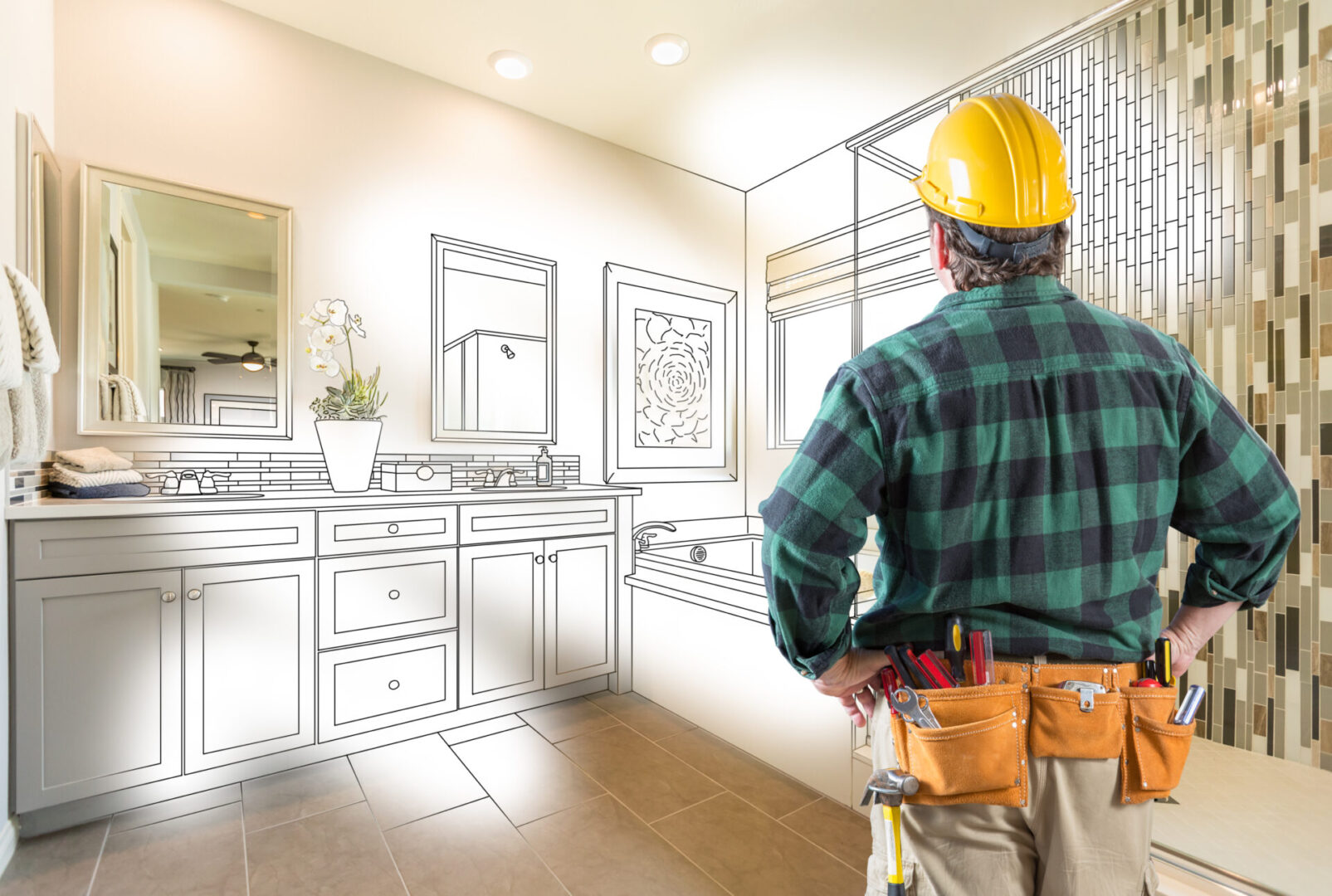 A man in hard hat standing in front of an unfinished bathroom.